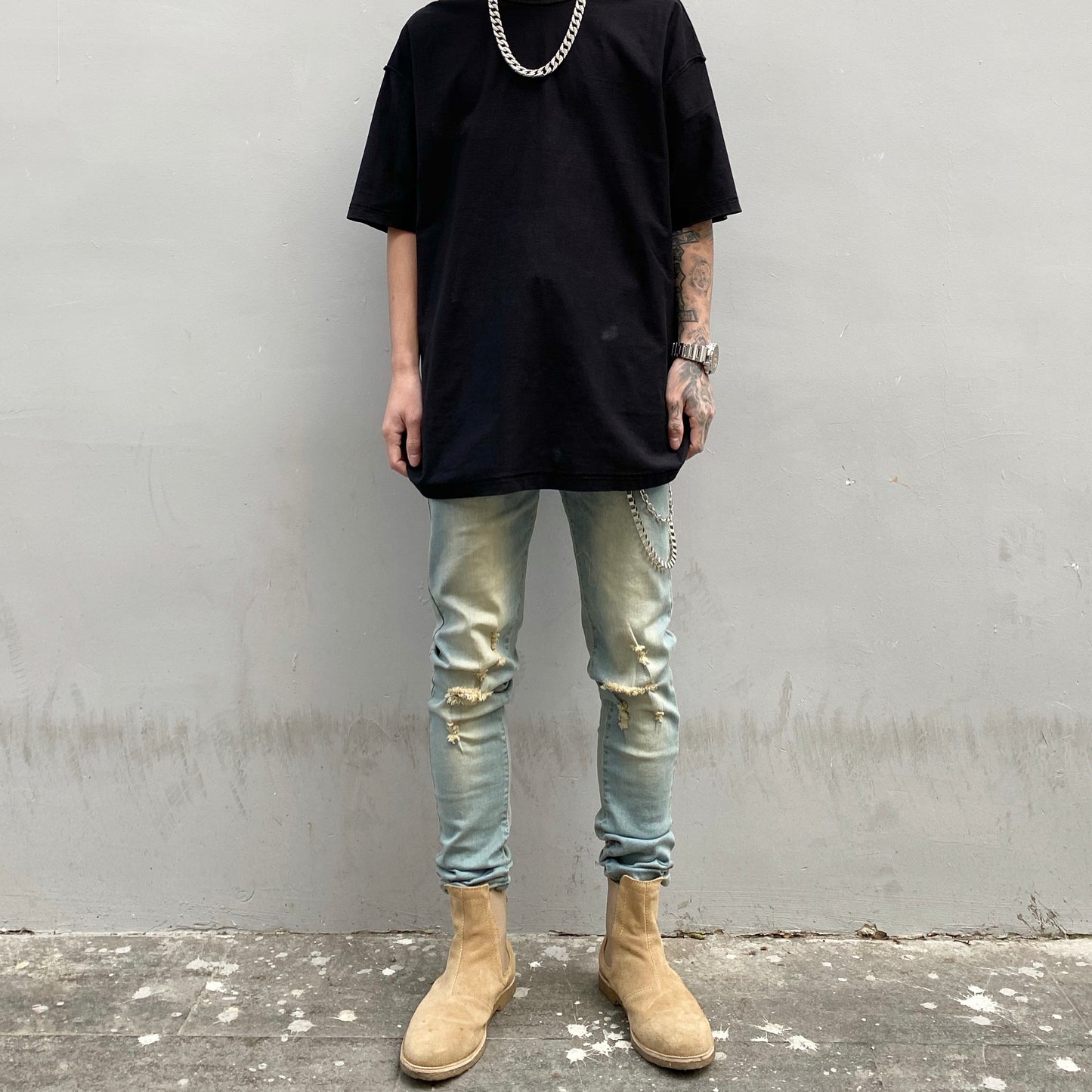 Washed worn slim fit frayed jeans