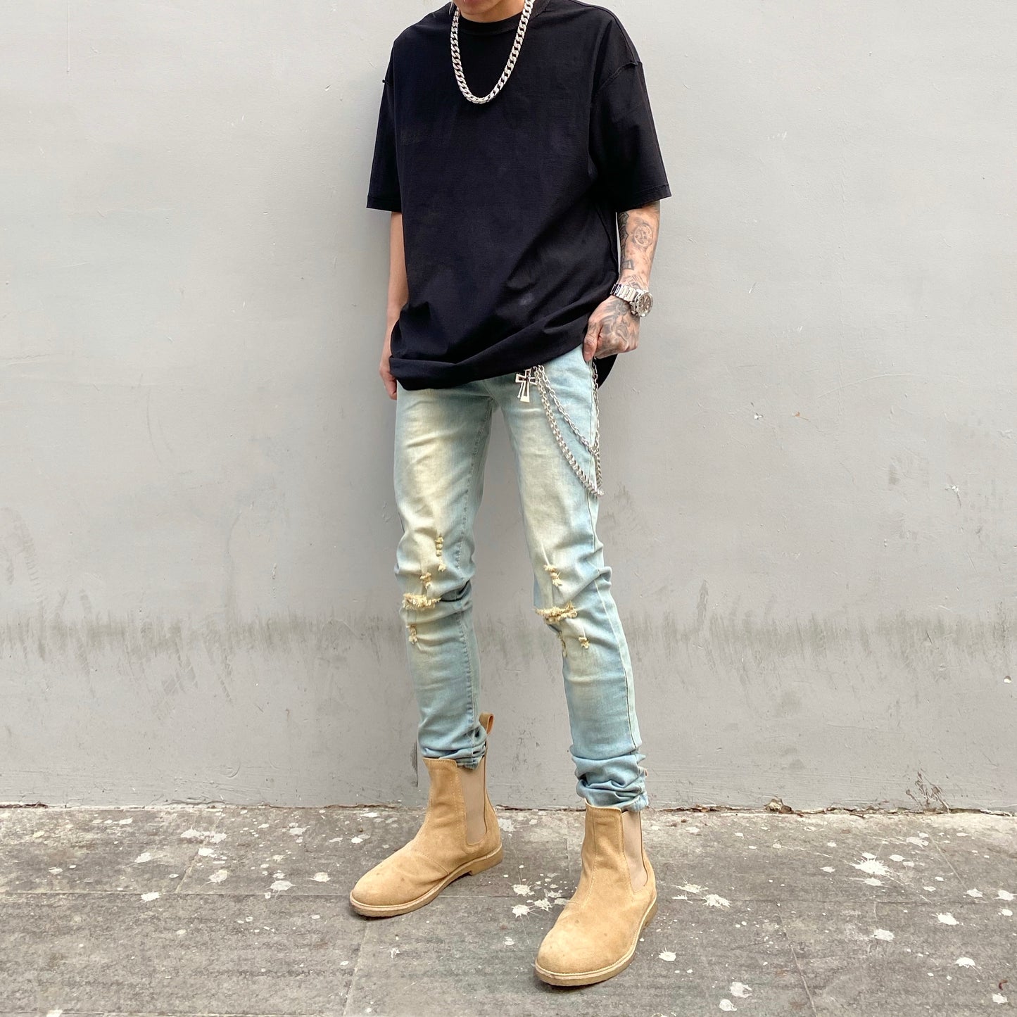 Washed worn slim fit frayed jeans