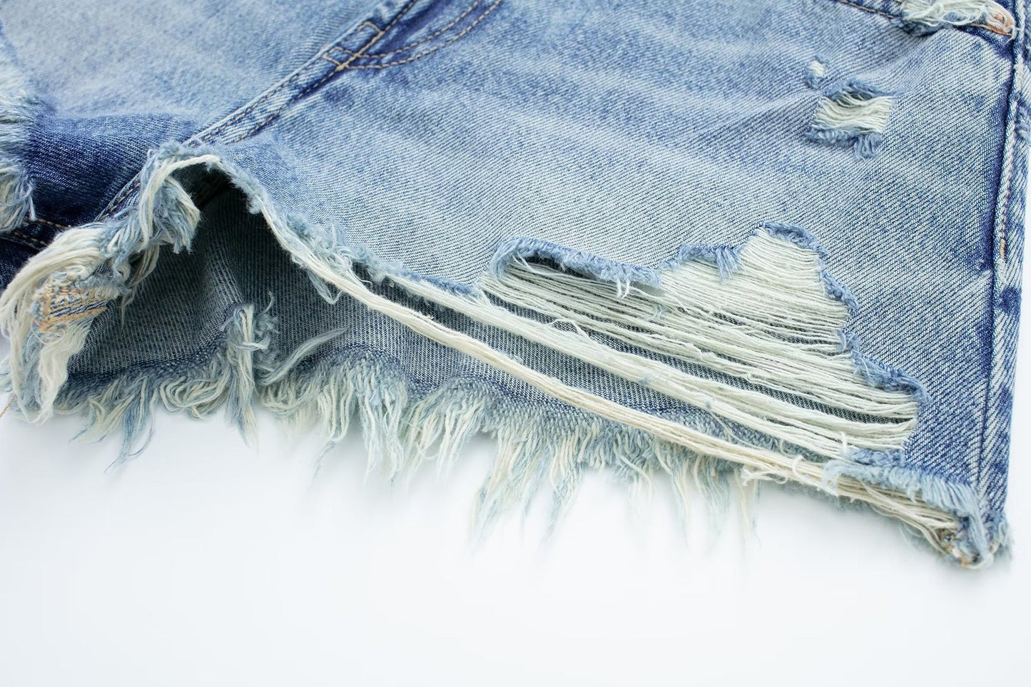 Raw Edge Distressed Denim Shorts