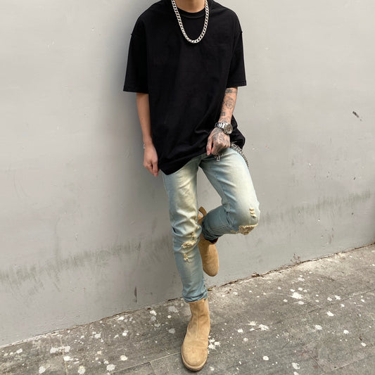 Washed worn slim fit frayed jeans