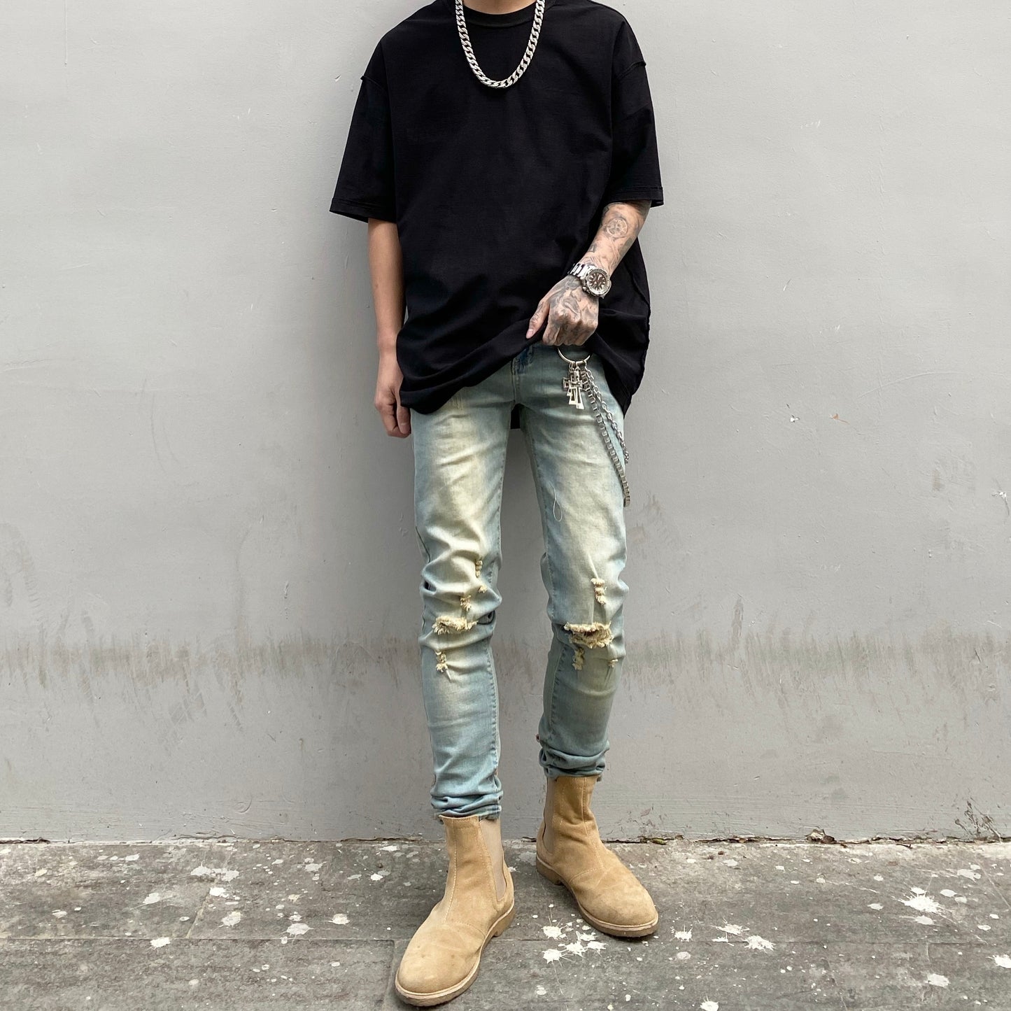 Washed worn slim fit frayed jeans