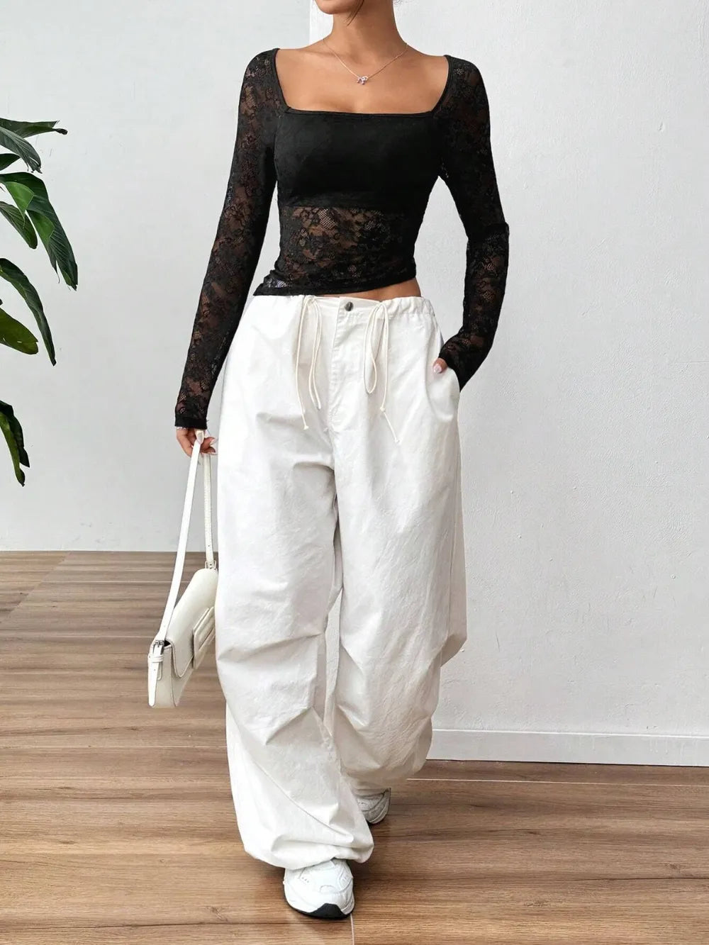 Lace U-Neck Asymmetrical Hem Shirt
